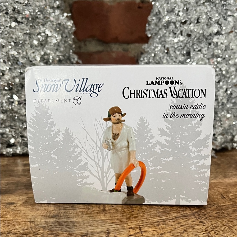 Department 56 Christmas Vacation Cousin Eddie Figurine in White and Orange